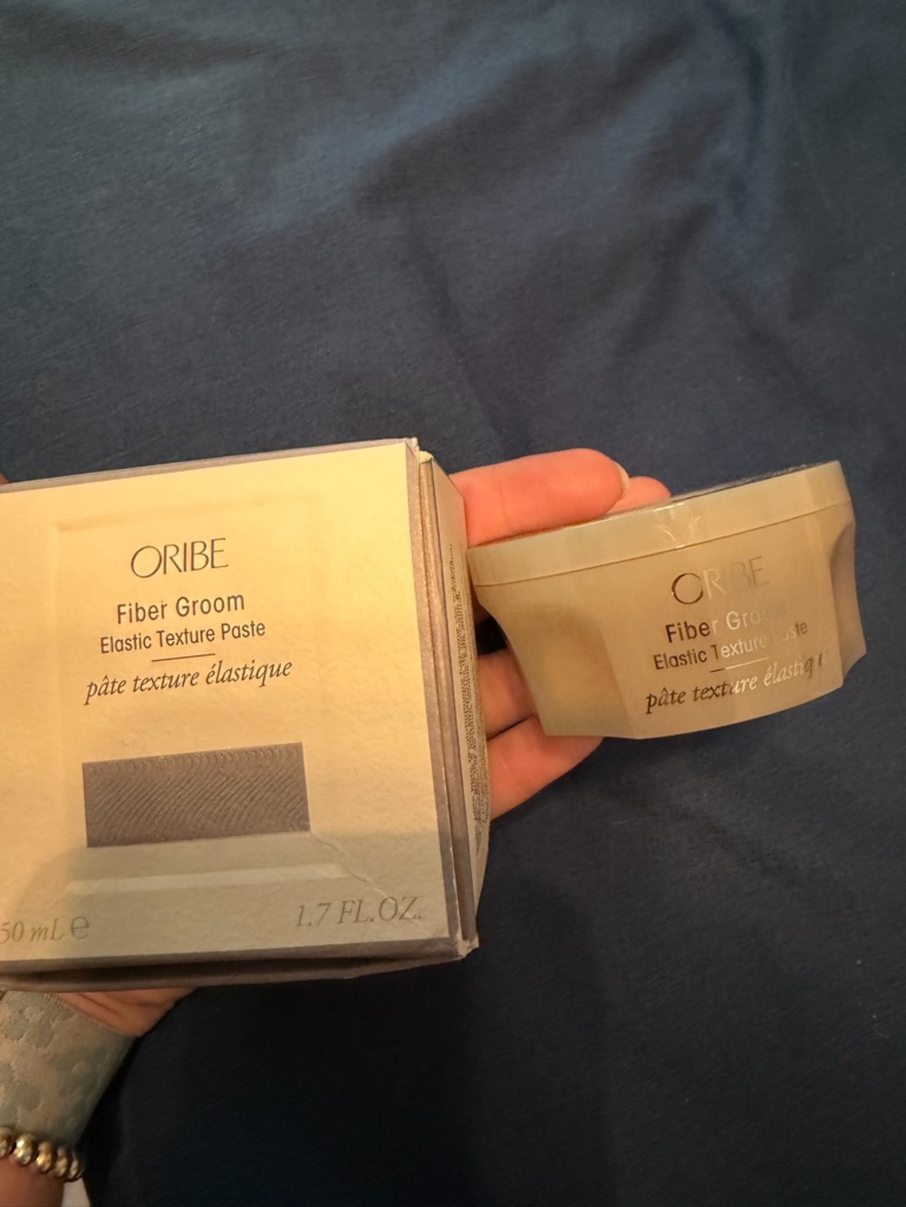 Oribe Fiber Groom Elastic Texture Paste - Beige/Taupe Packaging
